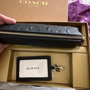 Coach id badge with lanyard and eye glass case.Ciomes with coach box too!